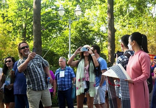 Foreigners visit Ho Chi Minh City. Photo: VNA