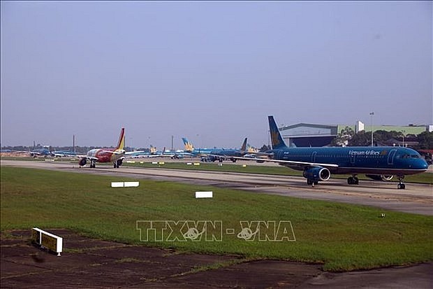 Nhập mPlanes are seen at Noi Bai International Airport in Ha Noi. (Photo: VNA)