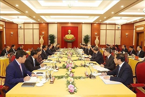 At the high-level meeting between the two Parties (Photo: VNA)