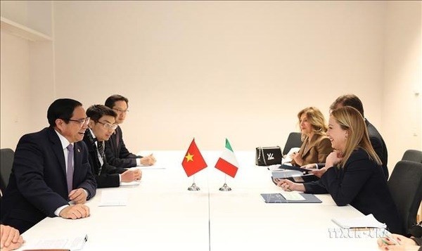 At the meeting between Prime Minister Pham Minh Chinh and his Italian counterpart Giorgia Meloni in Brussels on December 14, 2022 on the occasion of the ASEAN-EU Commemoration Summit. Photo: VNA
