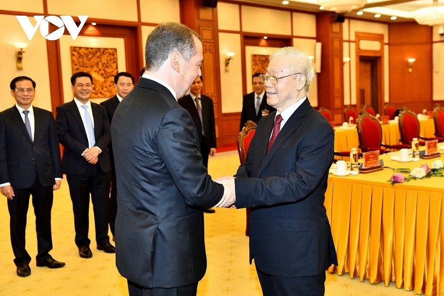 Party General Secretary Nguyen Phu Trong (R) welcomes Dmitry Medvedev, chairman of the United Russia Party and deputy chairman of the Security Council of the Russian Federation, in Hanoi on May 22.