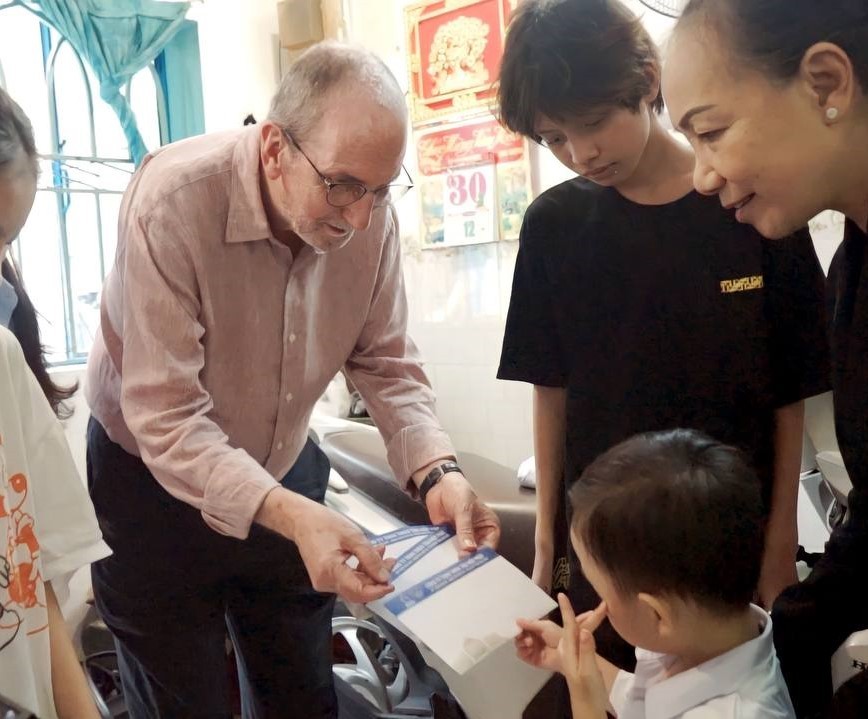 tan hiep phat group visits orphaned children supported by walking forward with you program
