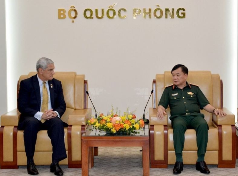 vietnam us cooperate closely in overcoming war consequences