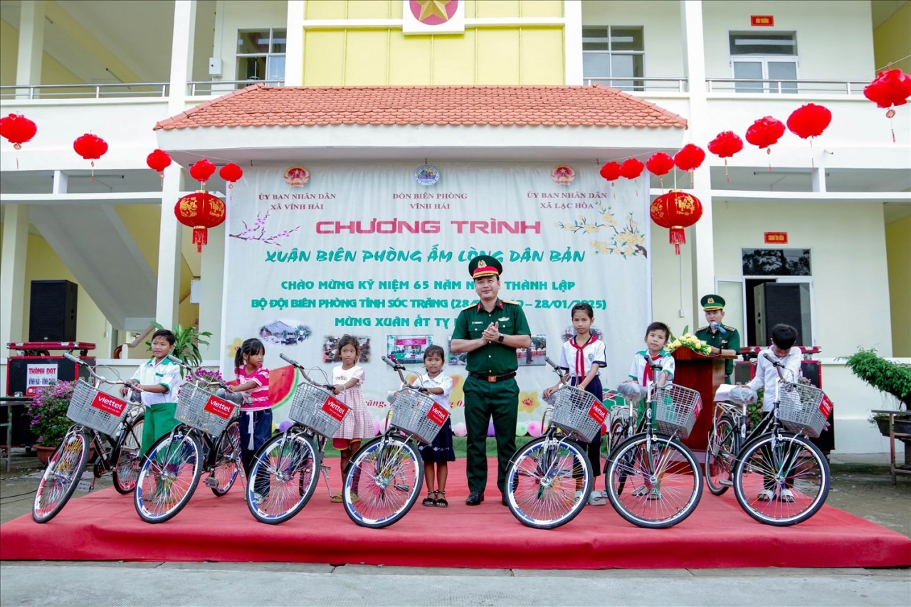 Giving bicycles to poor students at the