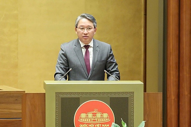 Minister of Justice Nguyen Hai Ninh presents the draft law to the National Assembly proposing amendments to the Law on Vietnamese Nationality, Ha Noi, May 17, 2025. Photo: VGP