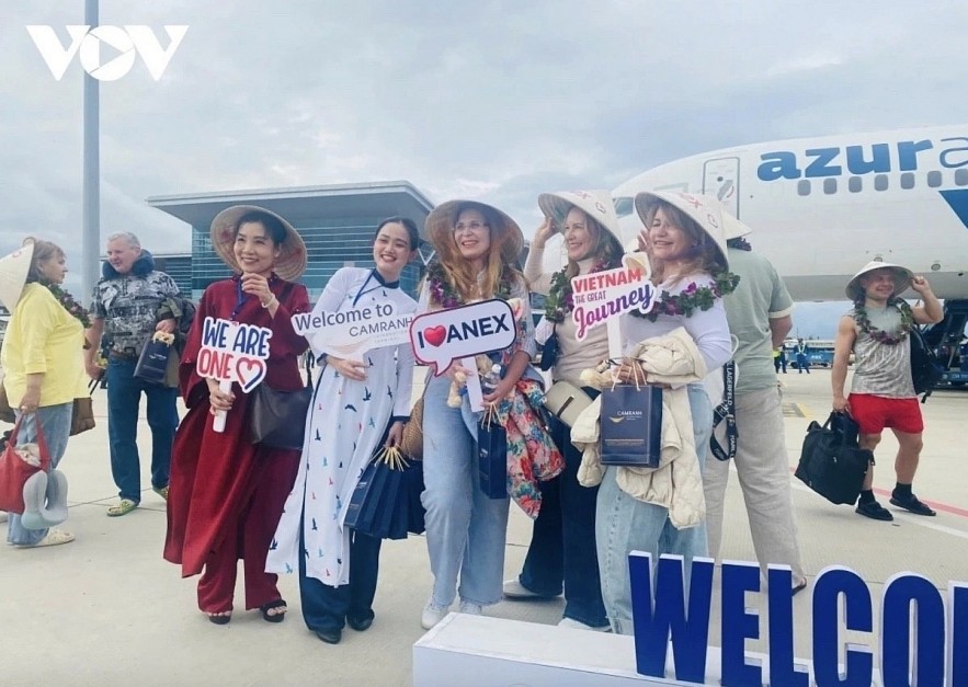 Russian tourists are welcomed at Cam Ranh International Airport on their flight back to Nha Trang City.
