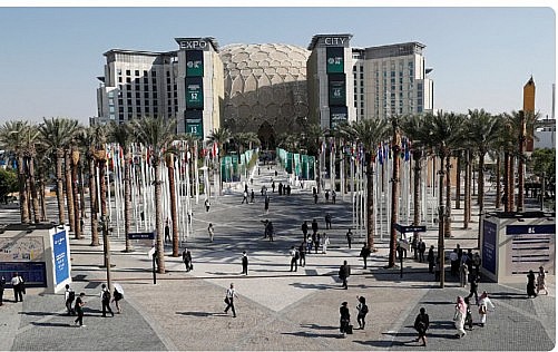 People walk at the Dubai's Expo City during the United Nations Climate Change Conference (COP28) in Dubai. - Reuters file