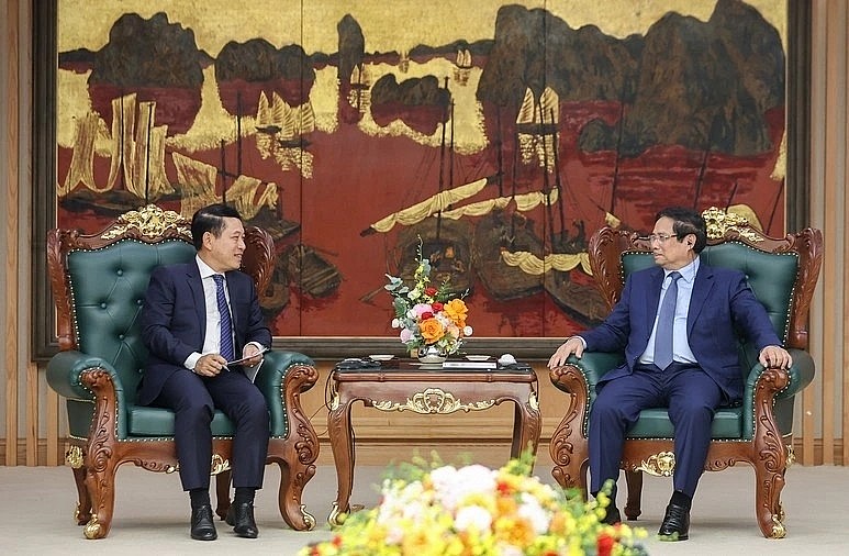 PM Pham Minh Chinh emphasizes Vietnam’s readiness to share experience with Laos on SOE reform, restructuring, as well as capital mobilisation and investment management  (Photo: VGP)