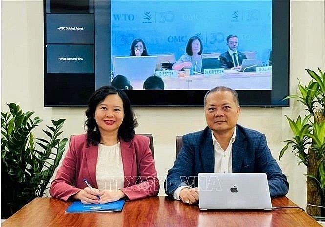 Director of the Import-Export Department Nguyen Anh Son and Deputy Director of the Import-Export Department Trinh Thi Thu Hien join the meeting online from Hanoi (Photo: VNA) Director of the Import-Export Department Nguyen Anh Son and Deputy Director of the Import-Export Department Trinh Thi Thu Hien join the meeting online from Hanoi (Photo: VNA)