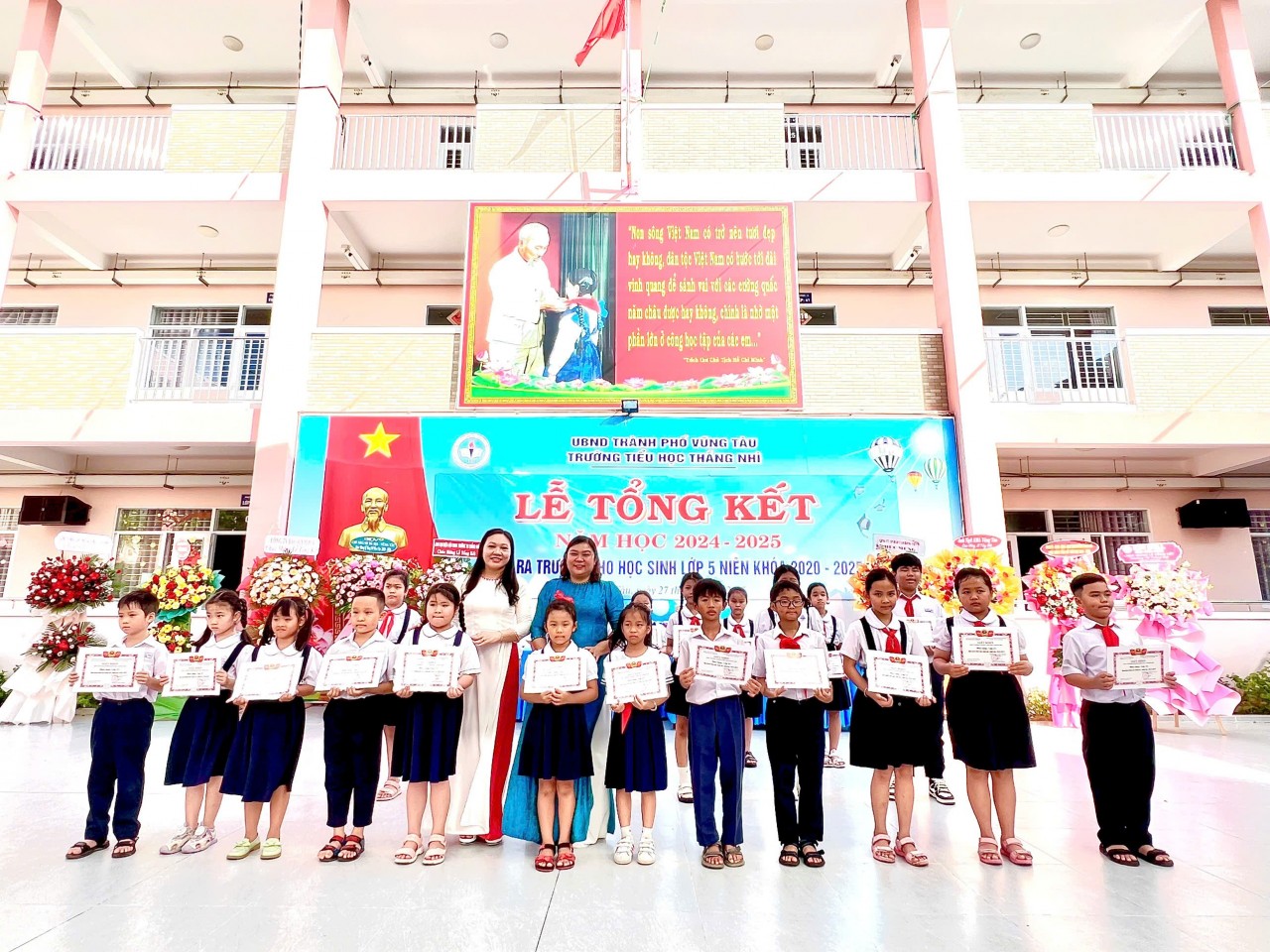 CiCi (second from left) earned the title of excellent student in first grade in Vietnam. CiCi (second from left) earned the title of excellent student in first grade in Vietnam.