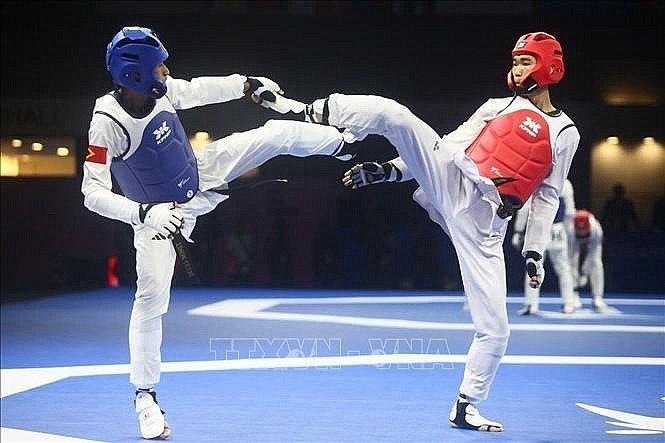 Nguyen Hong Trong (right) clinches the second gold medal for Vietnamese taekwondo. (Photo: VNA) Nguyen Hong Trong (right) clinches the second gold medal for Vietnamese taekwondo. (Photo: VNA)