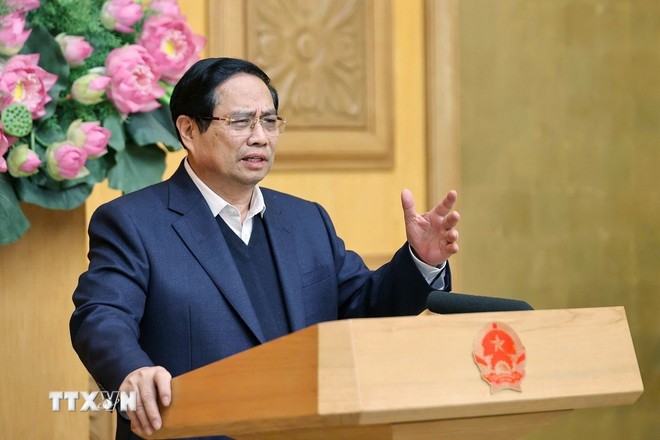 Prime Minister Pham Minh Chinh delivered remarks at the meeting. (Photo: Duong Giang/VNA)
