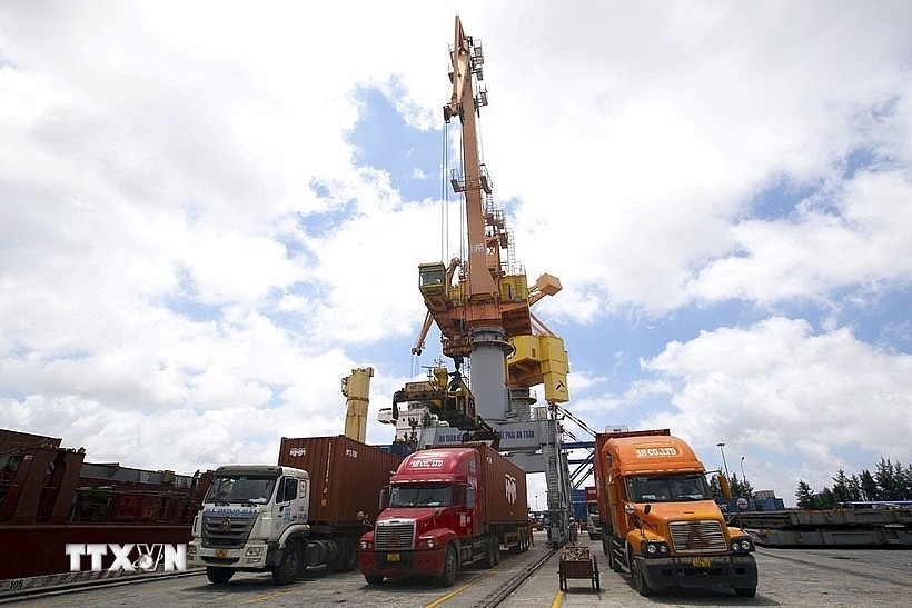 Trucks carrying export goods at Tan Vu Port in Hai Phong city (Photo: VNA)