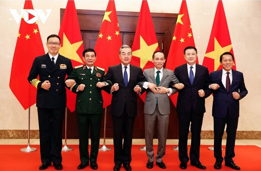 From left to right: Chinese Defence Minister Dong Jun, Vietnamese Defence Minister Phan Van Giang, Chinese Foreign Minister Wang Yi, Vietnamese Foreign Minister Le Hoai Trung, Chinese Public Security Minister Wang Xiaohong, and Vietnamese Public Security Minister Luong Tam Quang, pose for a group photo ahead of their strategic dialogue in Hanoi on March 16 From left to right: Chinese Defence Minister Dong Jun, Vietnamese Defence Minister Phan Van Giang, Chinese Foreign Minister Wang Yi, Vietnamese Foreign Minister Le Hoai Trung, Chinese Public Security Minister Wang Xiaohong, and Vietnamese Public Security Minister Luong Tam Quang, pose for a group photo ahead of their strategic dialogue in Hanoi on March 16