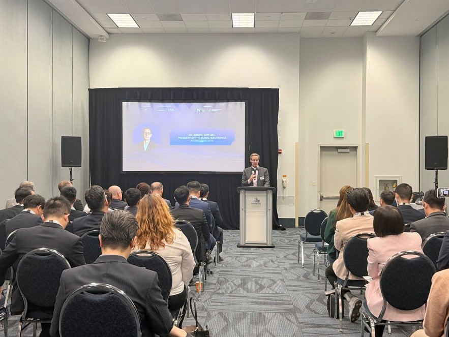 John W. Mitchell, Chairman of the Global Electronics Association (GEA), speaks at the forum on March 17. Photo: NIC