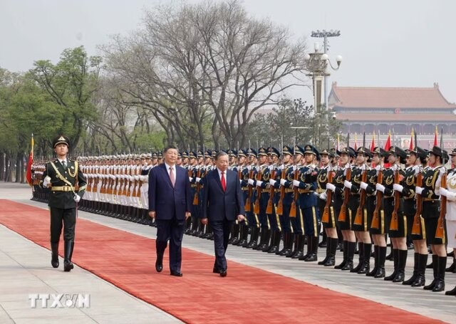General Secretary and President of Viet Nam To Lam and General Secretary and President of China Xi Jinping inspect the Guard of Honor at the Great Hall of the People in Beijing, China, April 15, 2026. General Secretary and President of Viet Nam To Lam and General Secretary and President of China Xi Jinping inspect the Guard of Honor at the Great Hall of the People in Beijing, China, April 15, 2026.