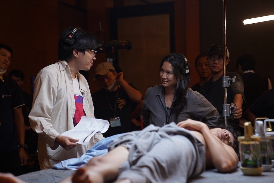 Director Nguyen Thien An and cinematographer Chananun Chotrungroj on the set of “Dream Is a Snail.”