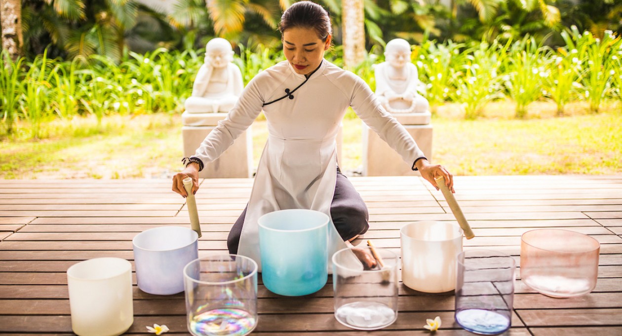   Visitors can enhance their wellness experiences like anti-gravity yoga, meditation sessions, and relaxing swims in a scenic beachfront infinity pool in Vietnam resorts