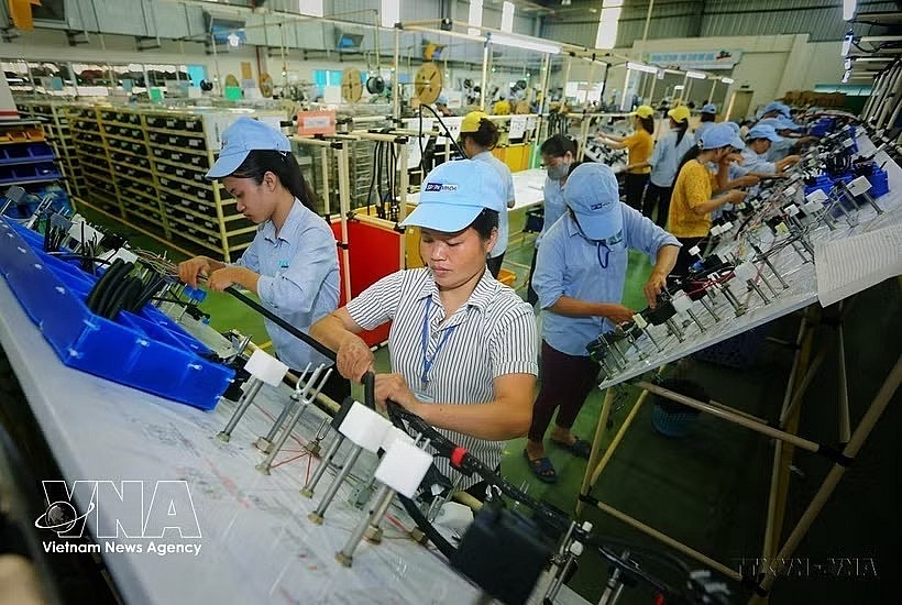 The refined sugar (RE) production line at the factory of KCP Vietnam Industrial Co., Ltd, a wholly Indian-owned company in Dak Lak province. (Photo: VNA)