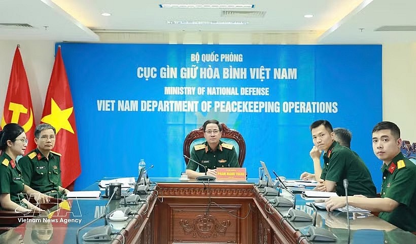 The Vietnamese delegation led by Major General Pham Manh Thang, Director of the Vietnam Department of Peacekeeping Operations, at the 10th meeting of the ASEAN Peacekeeping Centres Network (APCN), held online from May 4–8. (Photo: VNA)