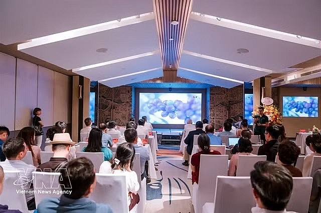 Participants attend a seminar on the development and promotion of the Son La Arabica coffee brand in Hanoi on June 19. (Photo: VNA)