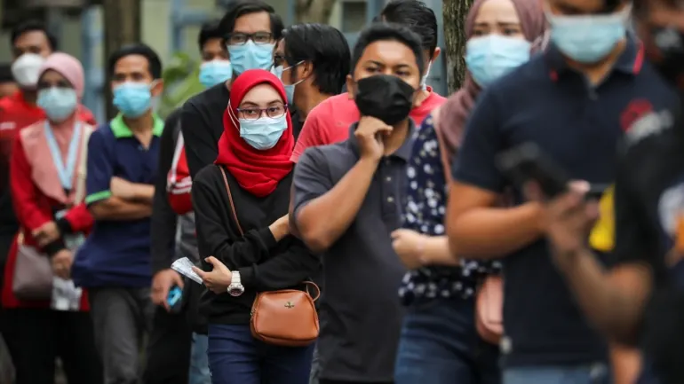 world covid 19 updates malaysia imposes targeted lockdowns