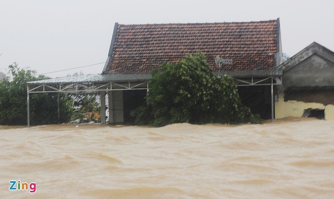 In Photos: Record flooding in central Vietnam, thousands of houses deluged in water