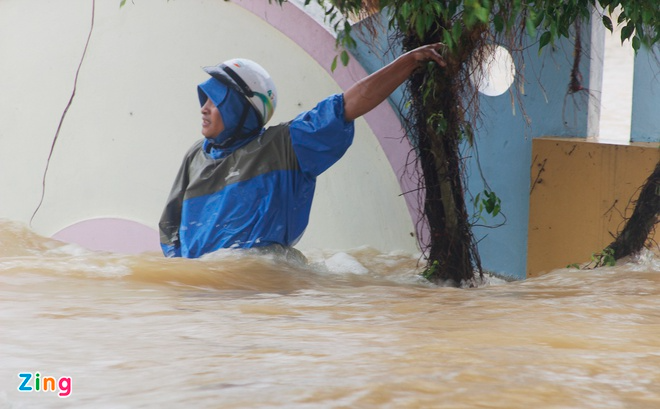 In Photos: Record flooding in central Vietnam, thousands of houses deluged in water