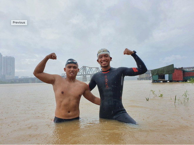 two vietnamese athletes make record as swimming over 200km in cold river water
