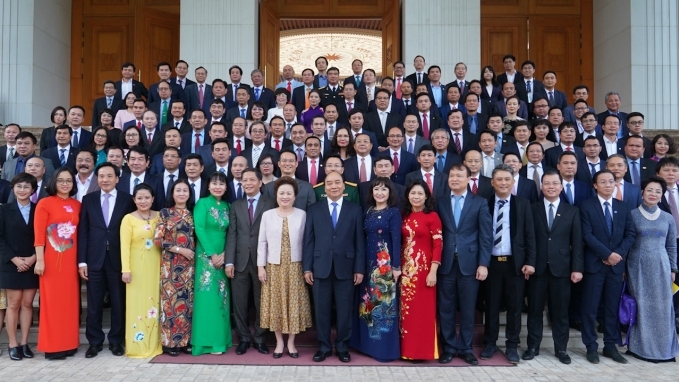 Prime Minister Nguyen Xuan Phuc and outstanding entrepreneurs at a meeting in 2020 (Photo: VGP) 