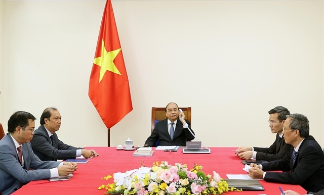 vietnamese singaporean pms hold phone talks on bilateral cooperation