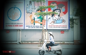 artful masion in hanoi with covid 19 themed propoganda graffiti catches attention