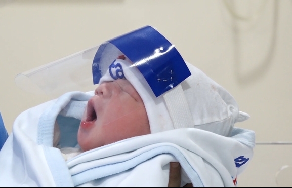 vietnam newborns get face shields for covid 19 protection