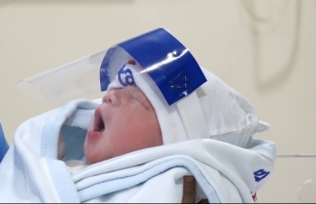 vietnam newborns get face shields for covid 19 protection