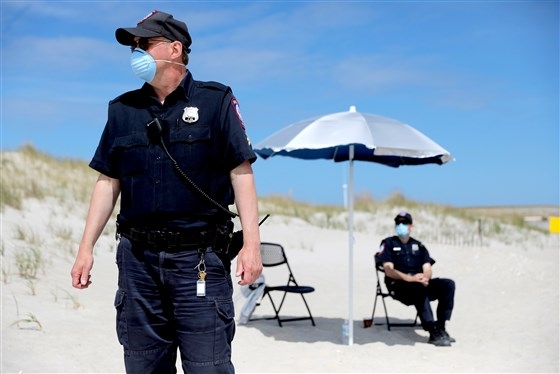 restrictive measures in place as us beaches reopen for memorial day amid covid 19 pandemic