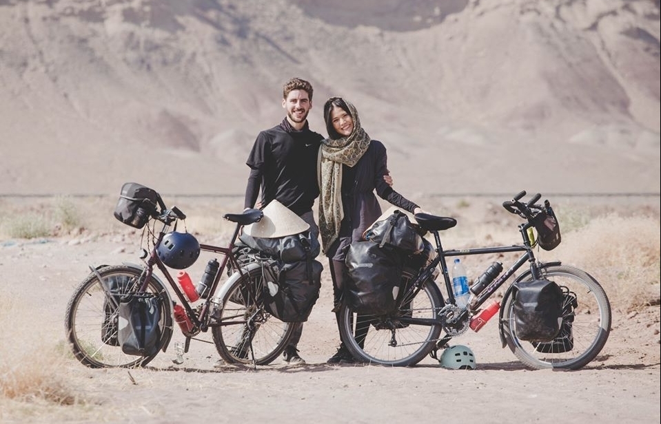 honey moon cycling tour to 18 countries for fundraising spreads love message
