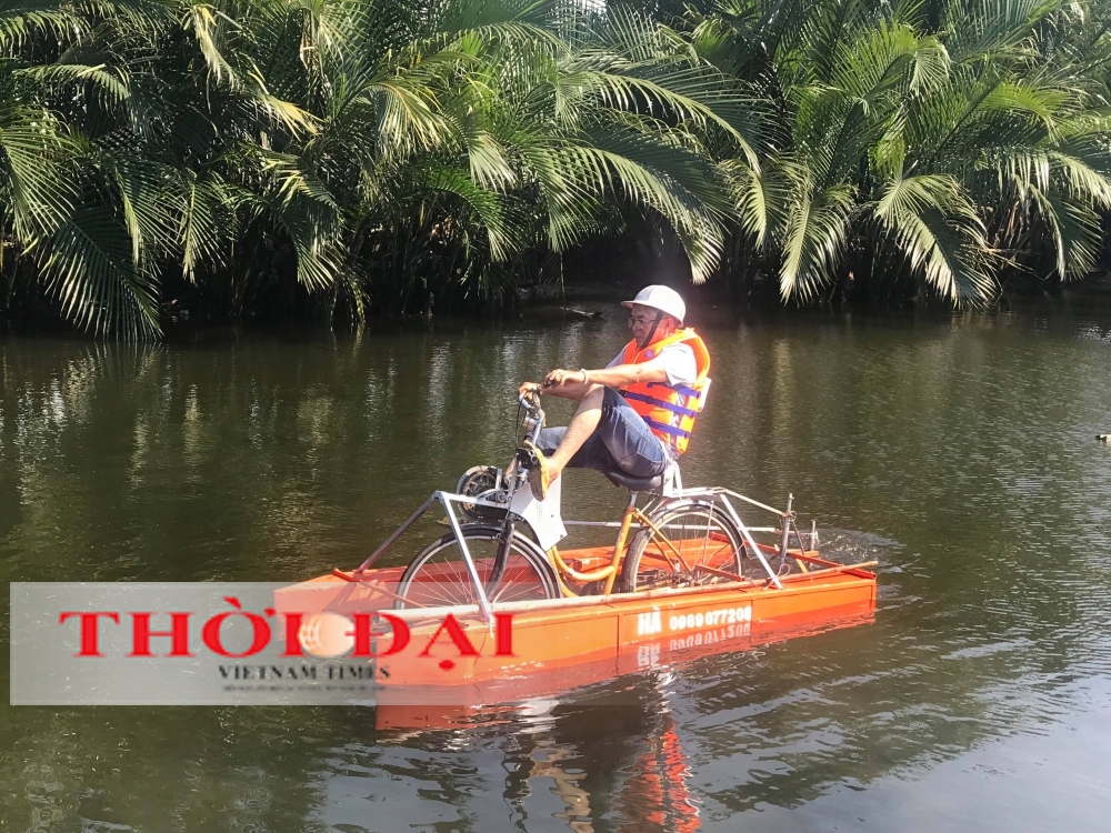 vietnamese farmer creates amphibious bicycle for new tourism experience