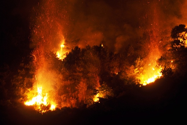 The initial fire was caused by some locals who burnt incense and offerings at the Vu Quang Cemetery