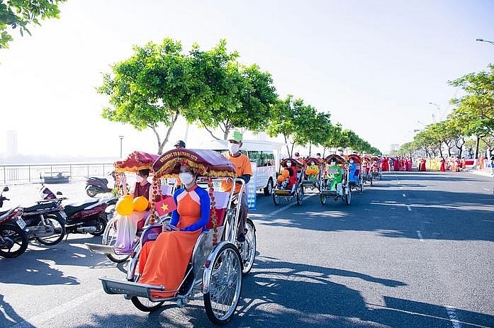 Women in Da Nang Parade in Ao Dai, Welcoming Month of Women