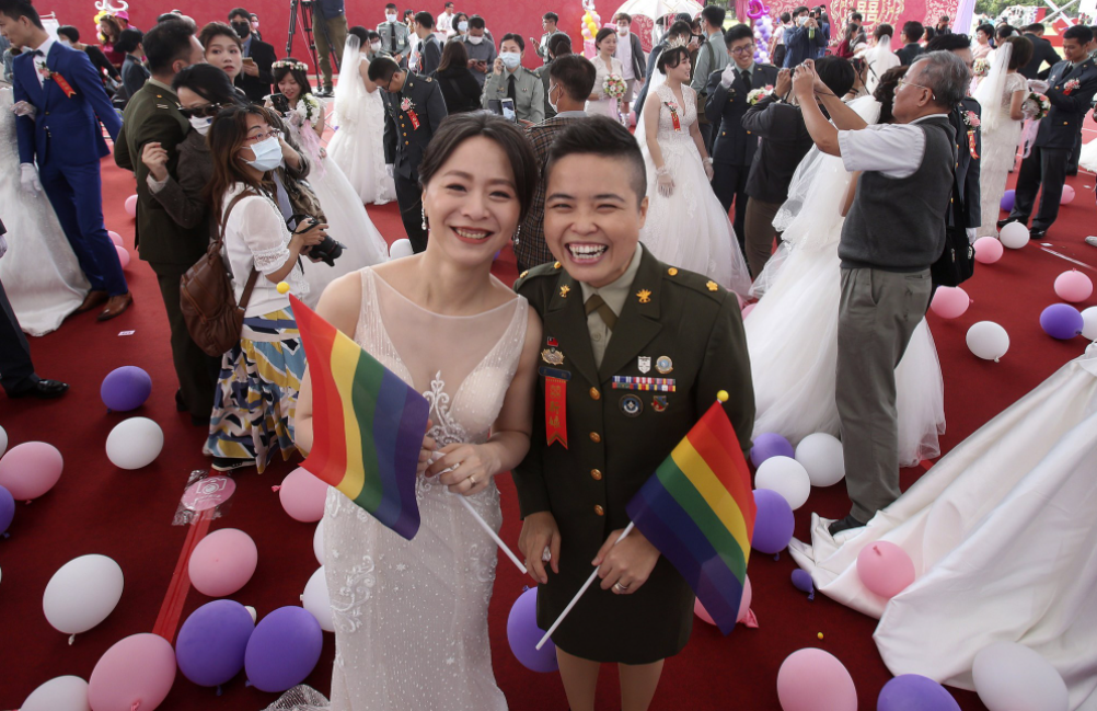 Taiwan’s Military welcomes first two same-sex couples to marry in mass wedding