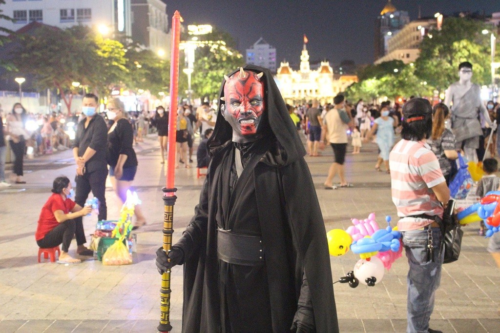 expats and young vietnamese celebrate halloween