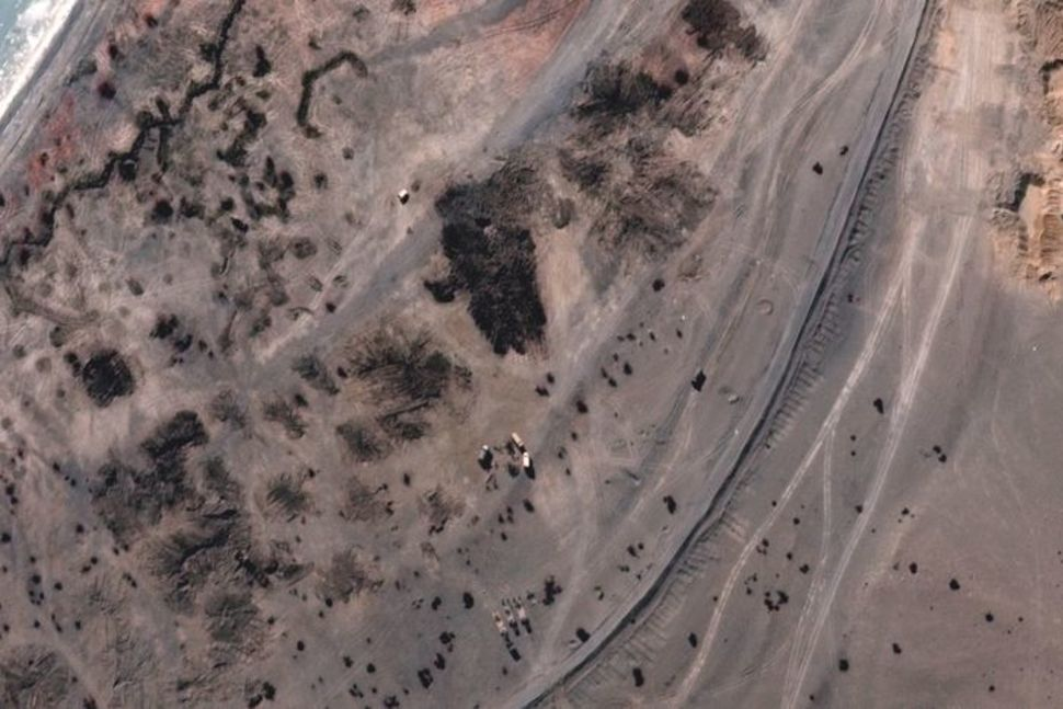 Satellite near China-India disputed border shows China emptied military camps