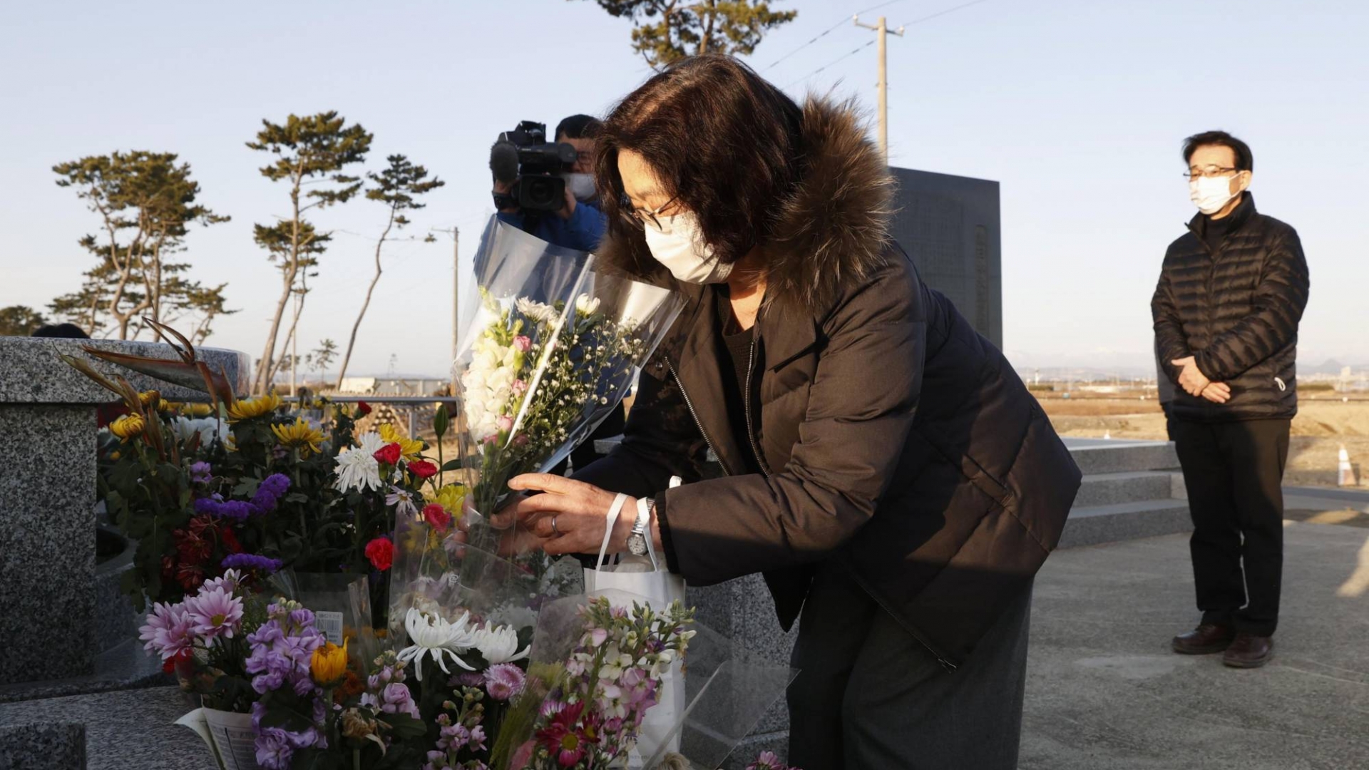 japan mourns lives lost in earthquake and fukushima disaster 10 years ago