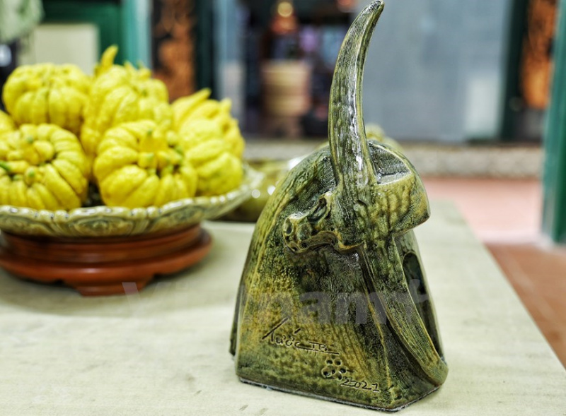 Vietnamese artisan features traditional culture through ceramic buffalo sculptures