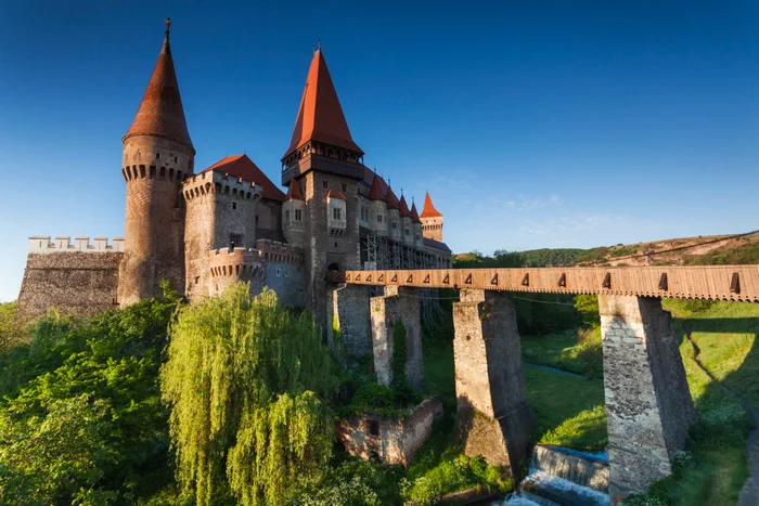 Corvin Castle in Transylvania at dawn (Photo by Walter Bibikow/Getty Images)