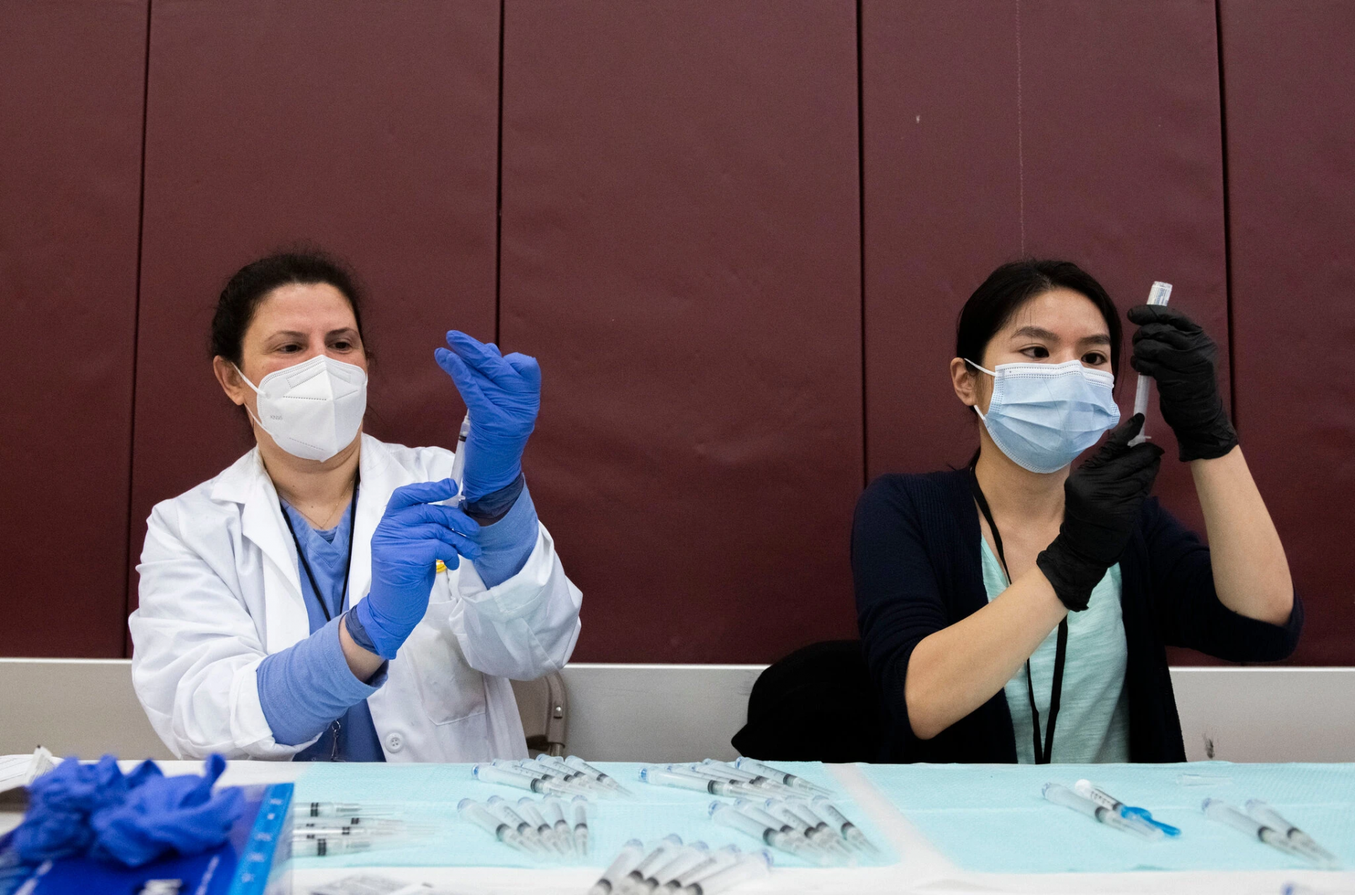 Pharmacists prepared syringes with the Johnson & Johnson vaccine in Detroit on Monday. More than seven million people in the United States have received the vaccine.Credit...Nicole Hester/Ann Arbor News, via Associated Press
