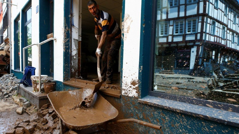Residents are getting on with the clean-up. Photo: Reuters 