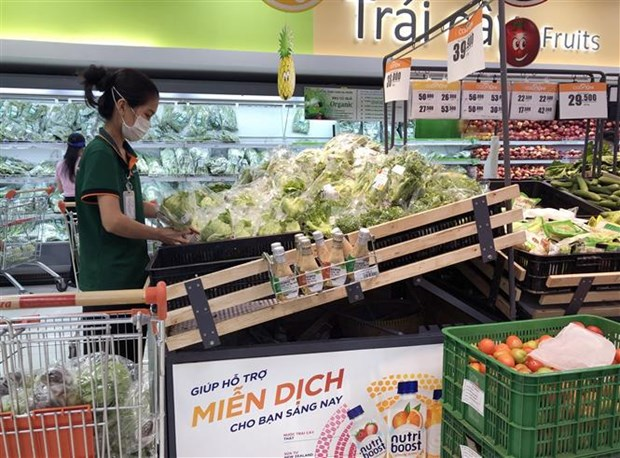 HCM City's total retail sales of goods and services reach about 542 trillion VND (23.5 billion USD) in the first half of 2021. (Photo: VNA)