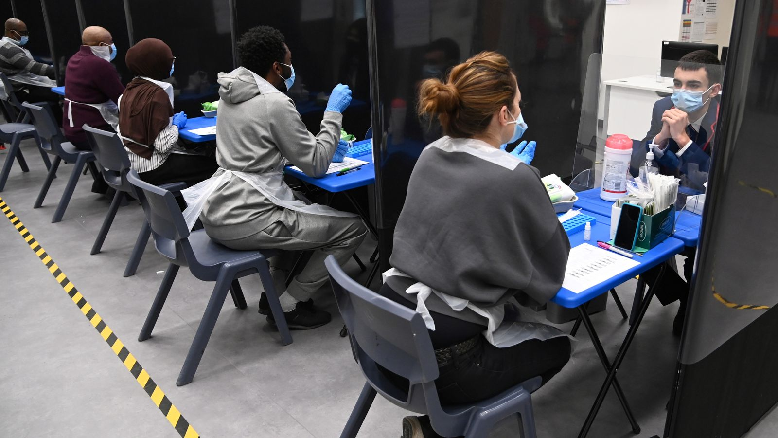 Students take coronavirus tests at Harris Academy Beckenham, in London. Photo: Getty Images 