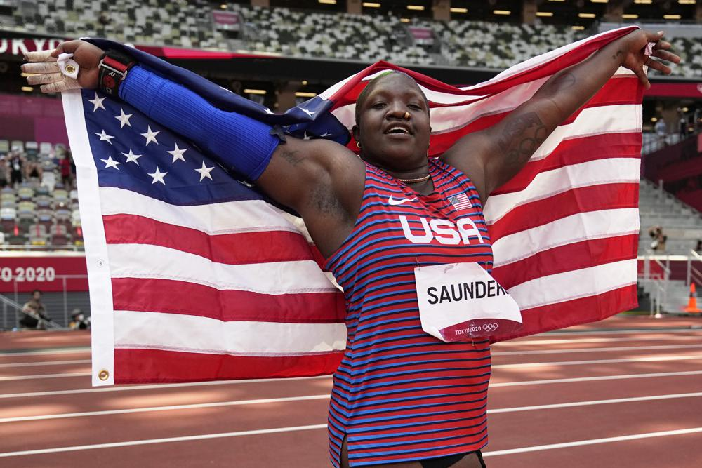 Raven Saunders, of United States, celebrates after her second place finish in the final of the women's shot put at the 2020 Summer Olympics, Sunday, Aug. 1, 2021, in Tokyo. (AP Photo/David J. Phillip)